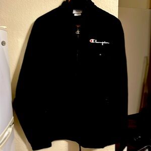 Champion, rainy day jacket. Zippered, two side pockets on zip. No hood. Size M.